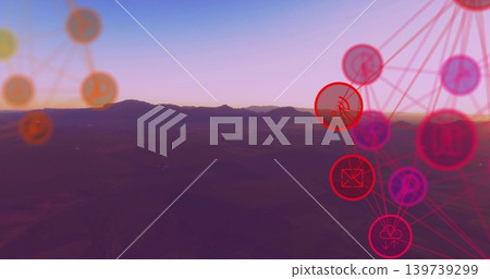 Stretching mountain ridge and valley running along horizon at sunrise, showing neon network overlay Stretching mountain ridge and valley running along horizon at sunrise, showing neon network overlay 139739299