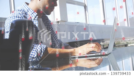 Coding man plaid shirt sleeves rolled typing on laptop by windows with binary overlay, copy space Coding man plaid shirt sleeves rolled typing on laptop by windows with binary overlay, copy space 139739433