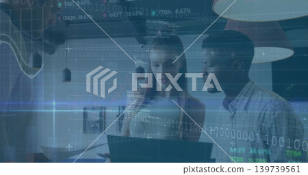 Analyzing laptop, woman in sleeveless top and man in business shirt studying data overlay in office Analyzing laptop, woman in sleeveless top and man in business shirt studying data overlay in office 139739561