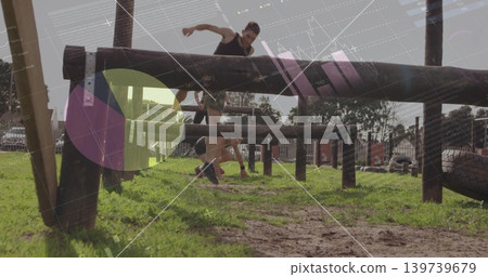 Jumping male athlete in athletic wear clearing wooden beam at park with tires and overlay graphic Jumping male athlete in athletic wear clearing wooden beam at park with tires and overlay graphic 139739679