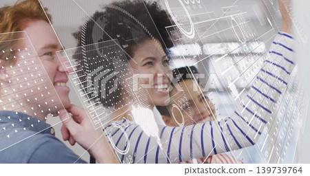 Tapping central woman wearing white navy striped top using glass board at lab, showing UI overlays Tapping central woman wearing white navy striped top using glass board at lab, showing UI overlays 139739764