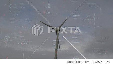 Displaying light gray turbine rising into overcast sky with nacelle three blades data overlay Displaying light gray turbine rising into overcast sky with nacelle three blades data overlay 139739960