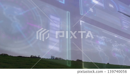 Displaying grassy hillside with low trees on horizon under overcast sky, showing HUD world map Displaying grassy hillside with low trees on horizon under overcast sky, showing HUD world map 139740056
