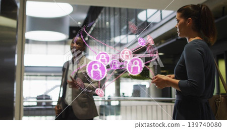 Viewing duo wearing suit and dress interacting with AR network in lobby, holding smartphone and bag Viewing duo wearing suit and dress interacting with AR network in lobby, holding smartphone and bag 139740080