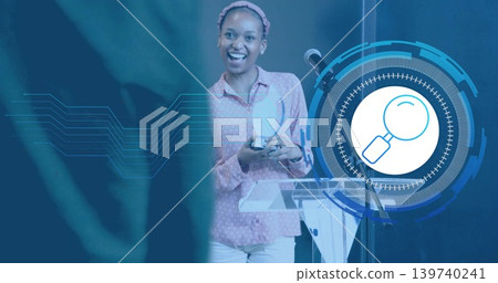 Smiling woman wearing pink blouse, holding round mirror at lectern with mic, HUD magnifier visible Smiling woman wearing pink blouse, holding round mirror at lectern with mic, HUD magnifier visible 139740241