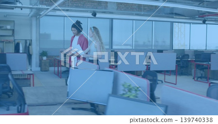 Walking coworkers in red jacket and sleeveless top, holding tablet and papers in office, copy space Walking coworkers in red jacket and sleeveless top, holding tablet and papers in office, copy space 139740338