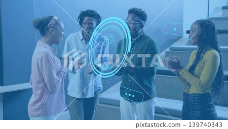 Gesturing four colleagues clapping around AR HUD in tiered meeting space, showing headband, glasses Gesturing four colleagues clapping around AR HUD in tiered meeting space, showing headband, glasses 139740343