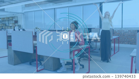 Meeting coworkers using laptop at modern office, man in red jacket with headphones, digital lock Meeting coworkers using laptop at modern office, man in red jacket with headphones, digital lock 139740433