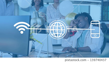 Laughing man leaning at desk wearing light shirt, watch with laptop balloons overlays, copy space Laughing man leaning at desk wearing light shirt, watch with laptop balloons overlays, copy space 139740437