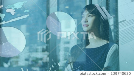 Gazing woman wearing business-casual dress at big glass window viewing digital overlays, copy space Gazing woman wearing business-casual dress at big glass window viewing digital overlays, copy space 139740620