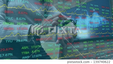 Standing analyst in jacket clasping hands, viewing clear ticker display in office with wristwatch Standing analyst in jacket clasping hands, viewing clear ticker display in office with wristwatch 139740622