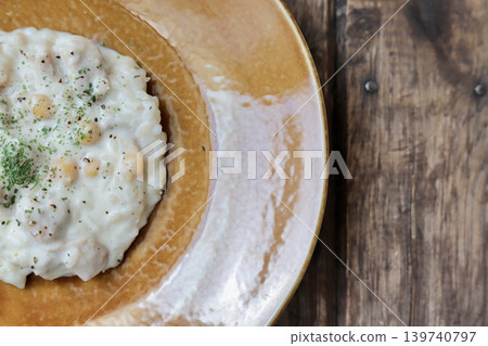 Chicken and chickpea cream risotto Chicken and chickpea cream risotto 139740797