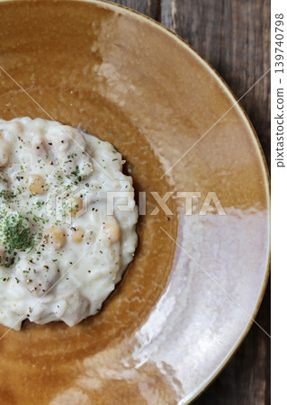 Chicken and chickpea cream risotto Chicken and chickpea cream risotto 139740798
