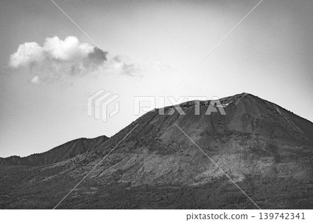 Black and White Dramatic View of Mount Vesuvius Volcano with a Cloud in Italy 139742341
