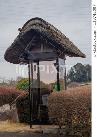 A thatched-roof telephone booth at Hitachi Fudoki Hill. A thatched-roof telephone booth at Hitachi Fudoki Hill. 139743097
