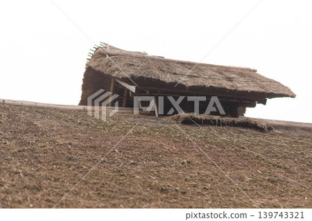 An old thatched-roof house on the hill in Hitachi Fudoki, Ibaraki Prefecture. An old thatched-roof house on the hill in Hitachi Fudoki, Ibaraki Prefecture. 139743321