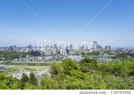 A panoramic view of Sendai city with fresh greenery from the ruins of Aoba Castle A panoramic view of Sendai city with fresh greenery from the ruins of Aoba Castle 139743498