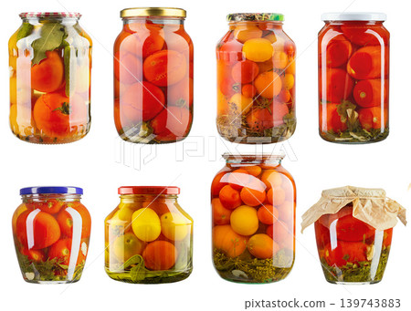 Set of assorted pickled tomatoes in glass jars isolated on white Set of assorted pickled tomatoes in glass jars isolated on white 139743883
