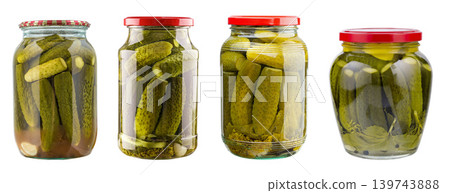 Pickled cucumbers in glass jars isolated on white background, homemade preserved vegetables 139743888