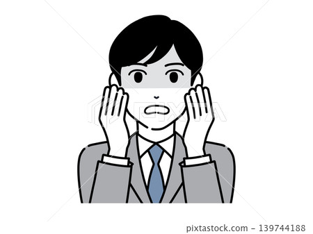 A young male office worker in a suit, visibly shaken, with both hands covering his cheeks. A young male office worker in a suit, visibly shaken, with both hands covering his cheeks. 139744188