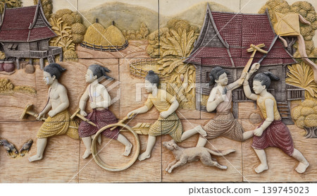 Traditional Thai Children Games in Relief Sculpture Traditional Thai Children Games in Relief Sculpture 139745023