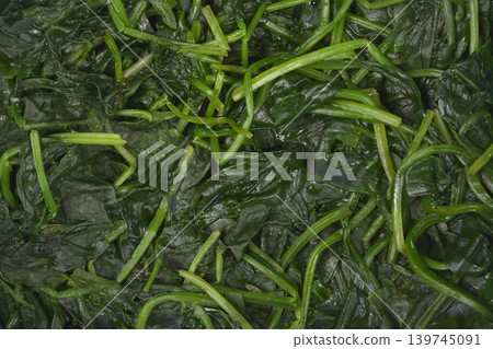 Close up of boiled spinach leaves and stems Close up of boiled spinach leaves and stems 139745091