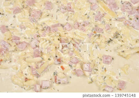 Puff pastry rolls preparation with cheese and ham Puff pastry rolls preparation with cheese and ham 139745148