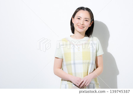 A white background with smiling, camera-facing images of working women such as childcare workers, caregivers, and mothers – an image for job hunting and recruitment. A white background with smiling, camera-facing images of working women such as childcare workers, caregivers, and mothers – an image for job hunting and recruitment. 139745387