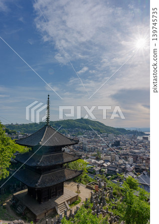 Tennei-ji Temple's three-story pagoda, the townscape of Onomichi, Hiroshima Prefecture, and the Seto Inland Sea. Tennei-ji Temple's three-story pagoda, the townscape of Onomichi, Hiroshima Prefecture, and the Seto Inland Sea. 139745735