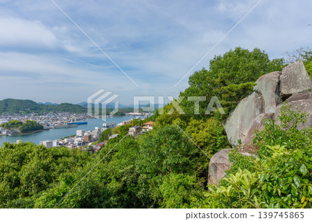 A view of Tsuzumi-iwa rock and the Onomichi Channel from Senkoji Park in Onomichi City, Hiroshima Prefecture. A view of Tsuzumi-iwa rock and the Onomichi Channel from Senkoji Park in Onomichi City, Hiroshima Prefecture. 139745865