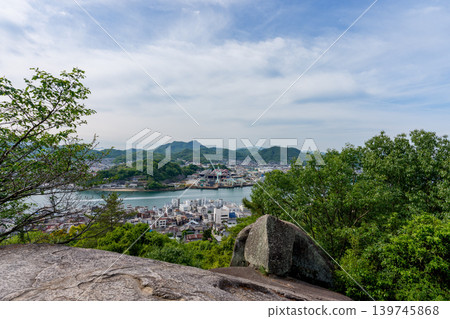 A view of Tsuzumi-iwa rock and the Onomichi Channel from Senkoji Park in Onomichi City, Hiroshima Prefecture. A view of Tsuzumi-iwa rock and the Onomichi Channel from Senkoji Park in Onomichi City, Hiroshima Prefecture. 139745868