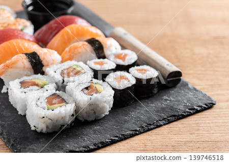 Fresh sushi assortment with salmon maki and nigiri Fresh sushi assortment with salmon maki and nigiri 139746518