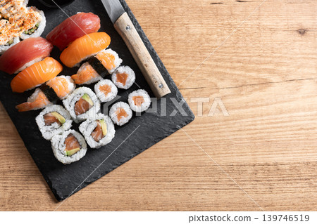Fresh sushi assortment with salmon maki and nigiri Fresh sushi assortment with salmon maki and nigiri 139746519