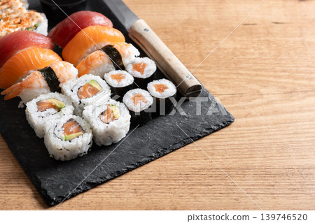 Fresh sushi assortment with salmon maki and nigiri Fresh sushi assortment with salmon maki and nigiri 139746520
