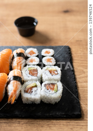 Fresh sushi assortment with salmon maki and nigiri Fresh sushi assortment with salmon maki and nigiri 139746524