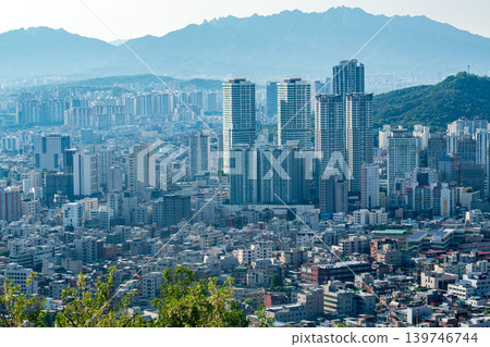 Seoul, South Korea - May. 17, 2026 : Panoramic high-angle view of Seoul cityscape and residential area from Yongmasan Mountain skywalk, South Korea Seoul, South Korea - May. 17, 2026 : Panoramic high-angle view of Seoul cityscape and residential area from Yongmasan Mountain skywalk, South Korea 139746744