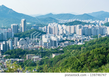 Seoul, South Korea - May. 17, 2026 : Panoramic high-angle view of Seoul cityscape and residential area from Yongmasan Mountain skywalk, South Korea Seoul, South Korea - May. 17, 2026 : Panoramic high-angle view of Seoul cityscape and residential area from Yongmasan Mountain skywalk, South Korea 139746747