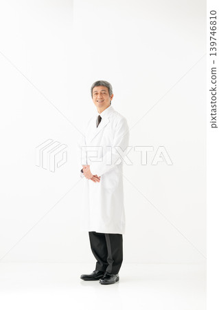 Medical man in a white coat, full body Medical man in a white coat, full body 139746810