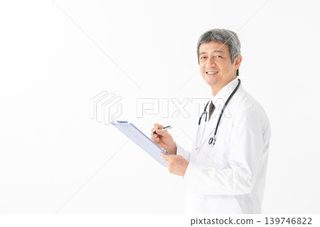 Medical, man in white coat, medical chart Medical, man in white coat, medical chart 139746822