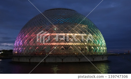 A dome on the sea that is lit up A dome on the sea that is lit up 139747306