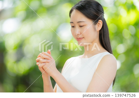 Fresh greenery, woman, beauty, hands Fresh greenery, woman, beauty, hands 139747526