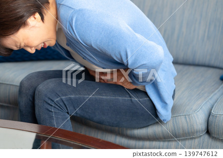 Female stomachache Female stomachache 139747612