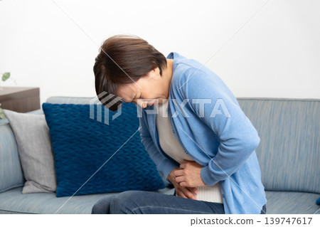 Female stomachache Female stomachache 139747617