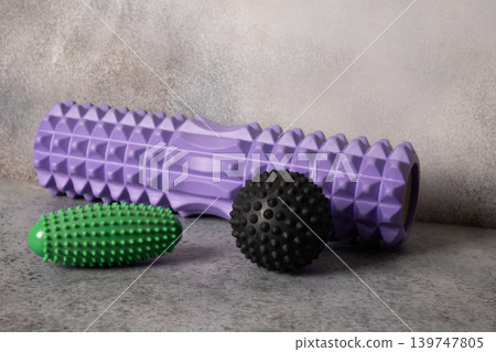 Massage tools for muscle recovery on neutral background Massage tools for muscle recovery on neutral background 139747805