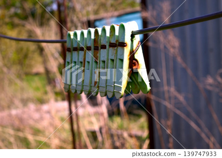 Old plastic clothespins. Old plastic clothespins. 139747933