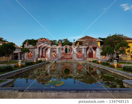 Vietnam trip, buildings reflected on the water 139748515