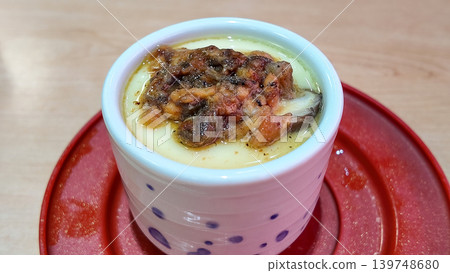 a steamed egg with toppings a steamed egg with toppings 139748680