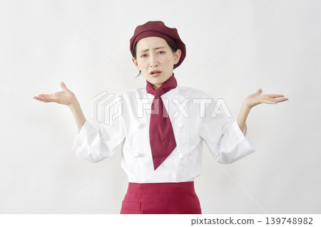 Female pastry chef/baker/cafe employee - gives up - white background Female pastry chef/baker/cafe employee - gives up - white background 139748982