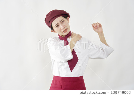 Female pastry chef/bakery/cafe employee; suffers from stiff shoulders; white background Female pastry chef/bakery/cafe employee; suffers from stiff shoulders; white background 139749003