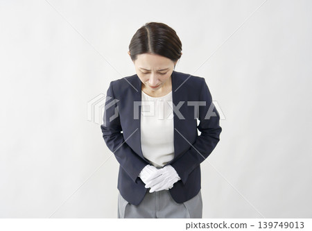 Female appraiser apologizes on a white background. Female appraiser apologizes on a white background. 139749013